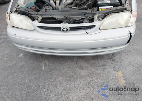 1999 Toyota Corolla Ce from USA, damaged, VIN 1NXBR12E8XZ244085